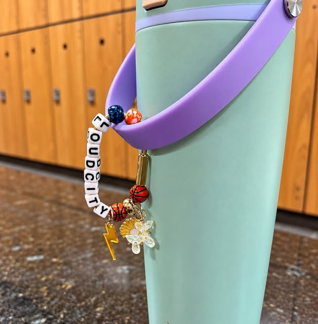Loud City hook with basketball and lightning charms attached to a mint tumbler